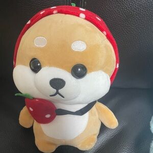 Plushie with strawberry hat and bag